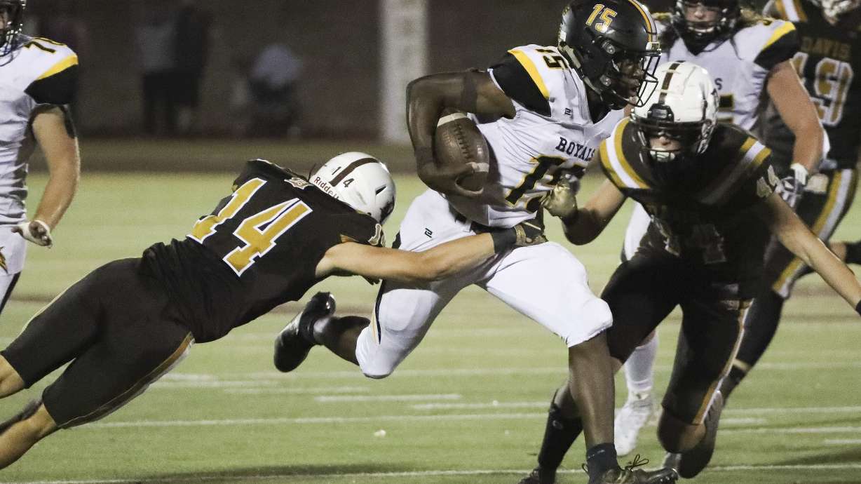Roy and Davis play football in Kaysville on Friday, Sept. 18, 2020.