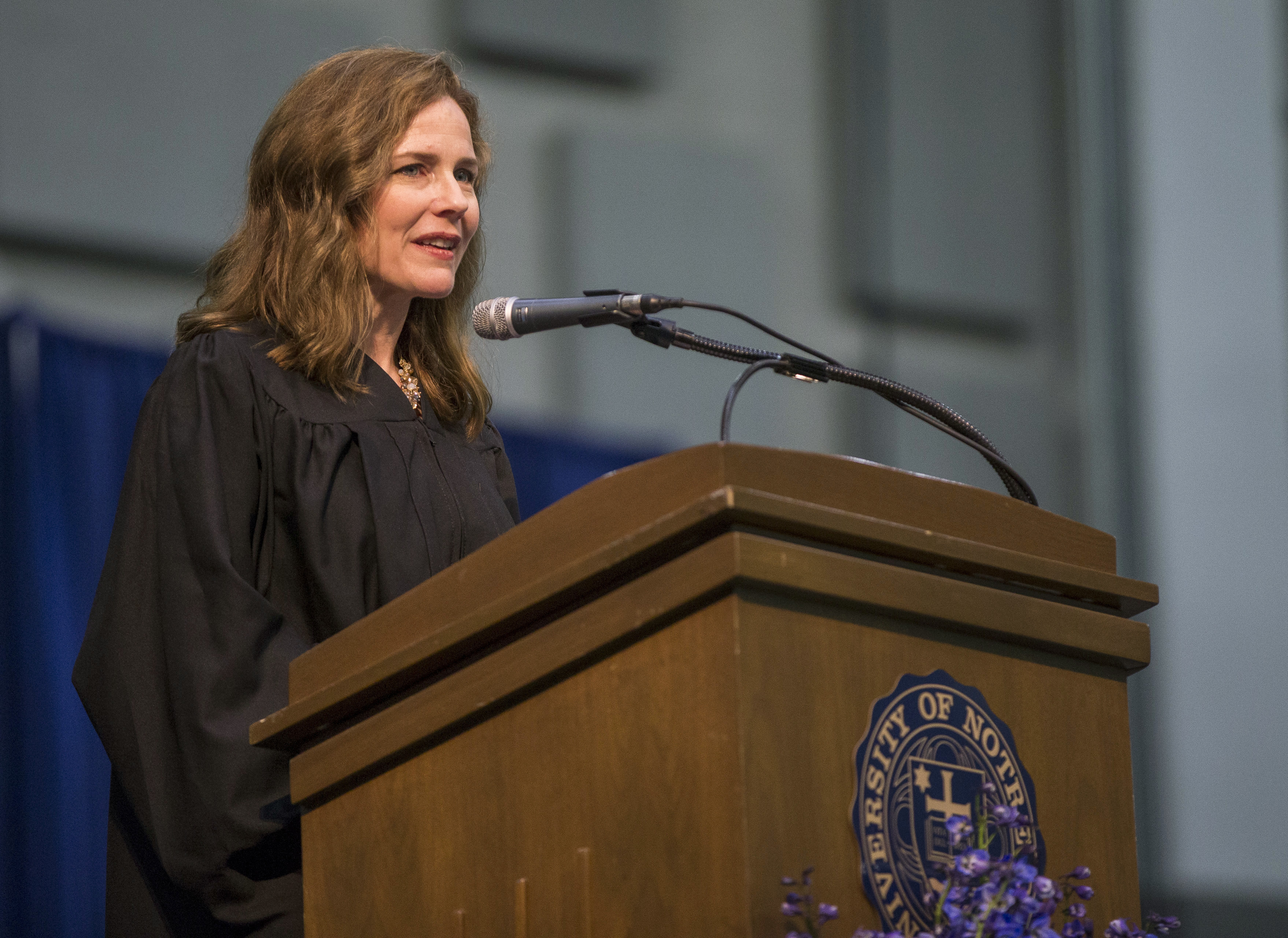 FILE - In this May 19, 2018, file photo, Amy Coney Barrett, United States Court of Appeals for the Seventh Circuit judge, speaks during the University of Notre Dame's Law School commencement ceremony at the university, in South Bend, Ind. Barrett, a front-runner to fill the Supreme Court seat vacated by the death of Justice Ruth Bader Ginsburg, has established herself as a reliable conservative on hot-button legal issues from abortion to gun control. (Robert Franklin/South Bend Tribune via AP, File) [Sep-22-2020]