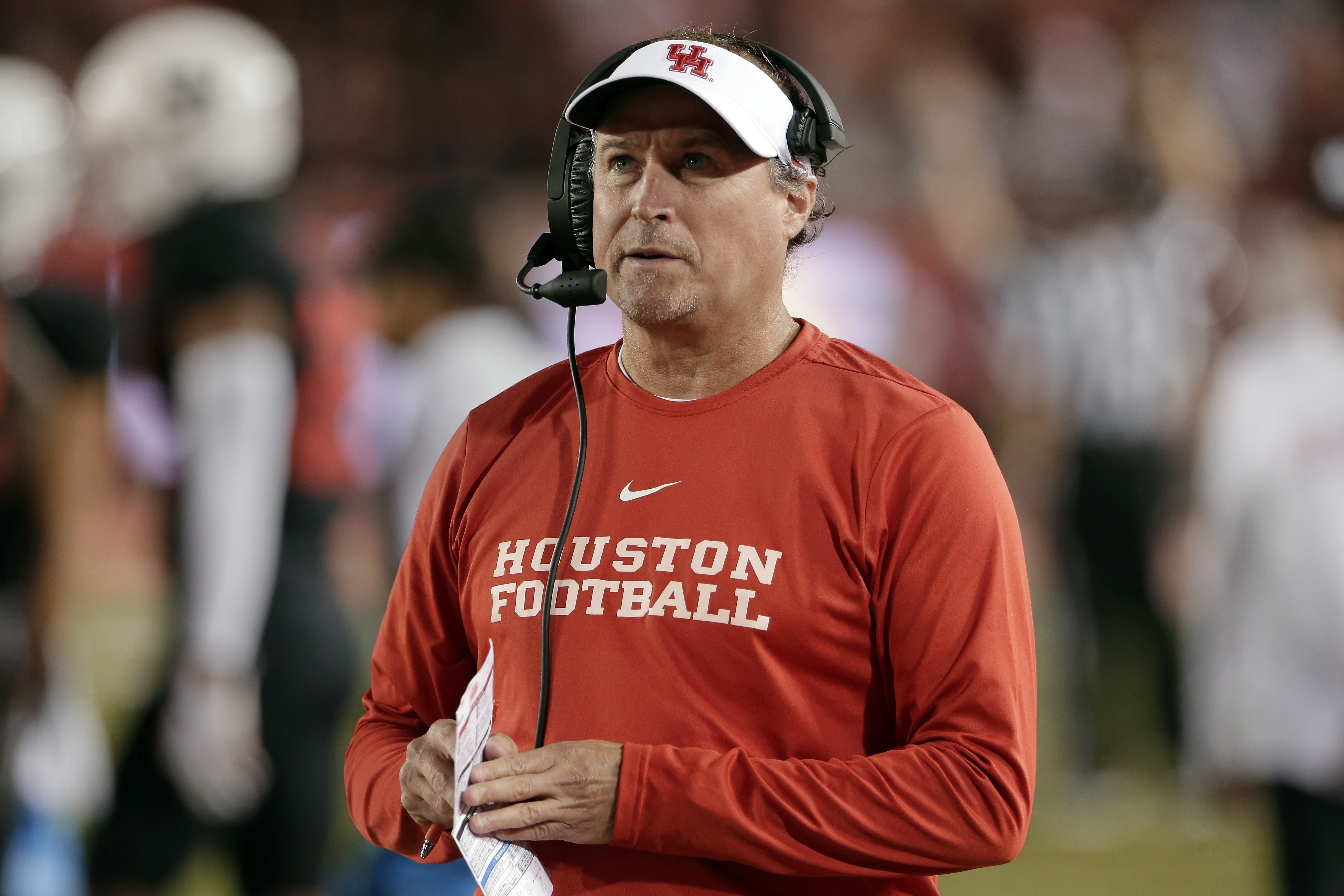 FILE - In this Oct. 24, 2019, file photo, Houston coach Dana Holgorsen watches during the second half of the team's NCAA college football game against SMU in Houston. Holgorsen, in his second year at Houston, and the Cougars face Baylor this week, in the first meeting between the schools since 1995. (AP Photo/Michael Wyke, File) [Sep-23-2020]