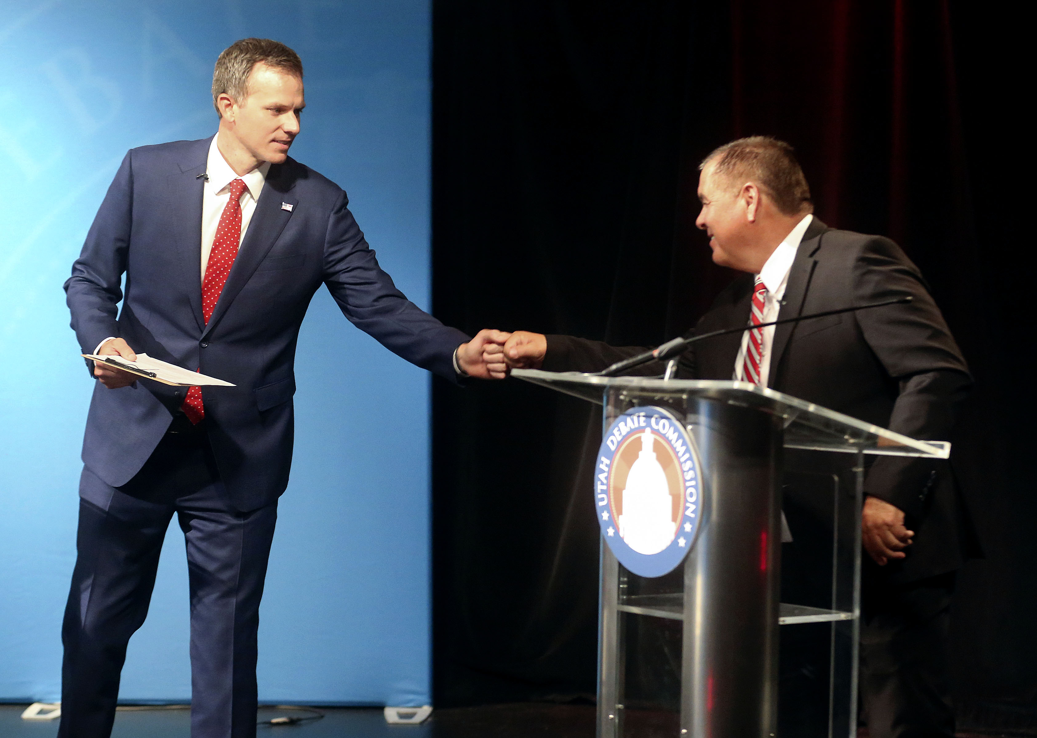 Republican Blake Moore and Democrat Darren Perry, candidates for the 1st Congressional District seat, fist-bump after participating in a debate at the Triad Center on Thursday, Sept. 24, 2020.