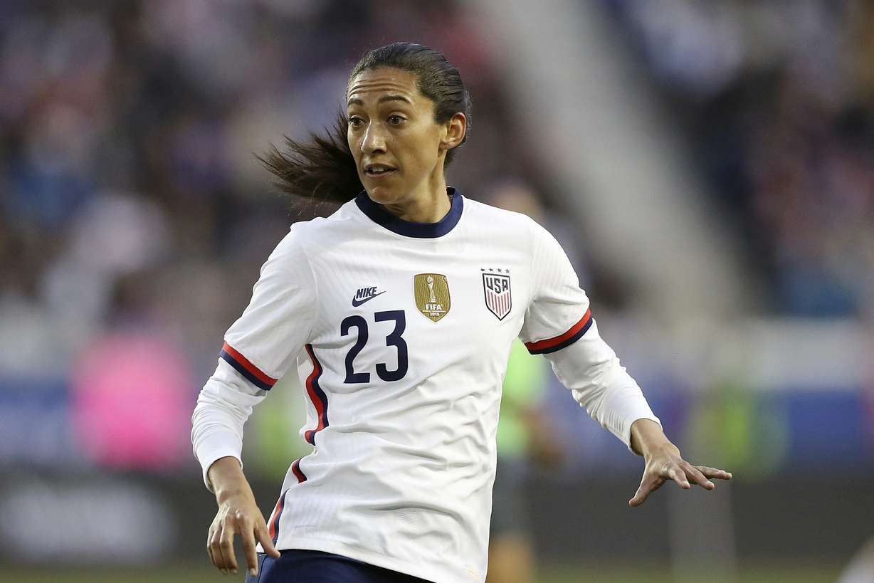 In this March 8, 2020, file photo, United States forward Christen Press looks for a pass during the second half of a SheBelieves Cup soccer match against Spain, in Harrison, N.J. Press says she wants to honor Kobe Bryant by playing for Manchester United wearing a No. 24 jersey. The American's usual No. 23 was already taken when she signed for a season with the English club earlier in September, 2020.