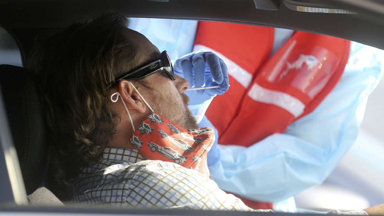 Frank Preston, Butterfield Canyon and Herriman Elementary School administrator, gets tested for COVID-19 outside of Corner Canyon High School in Draper on Monday, Sept. 21, 2020. The Salt Lake County Health Department will be offering COVID-19 testing at Corner Canyon High School again on Monday, Sept. 28, from 4 p.m. to 7 p.m.