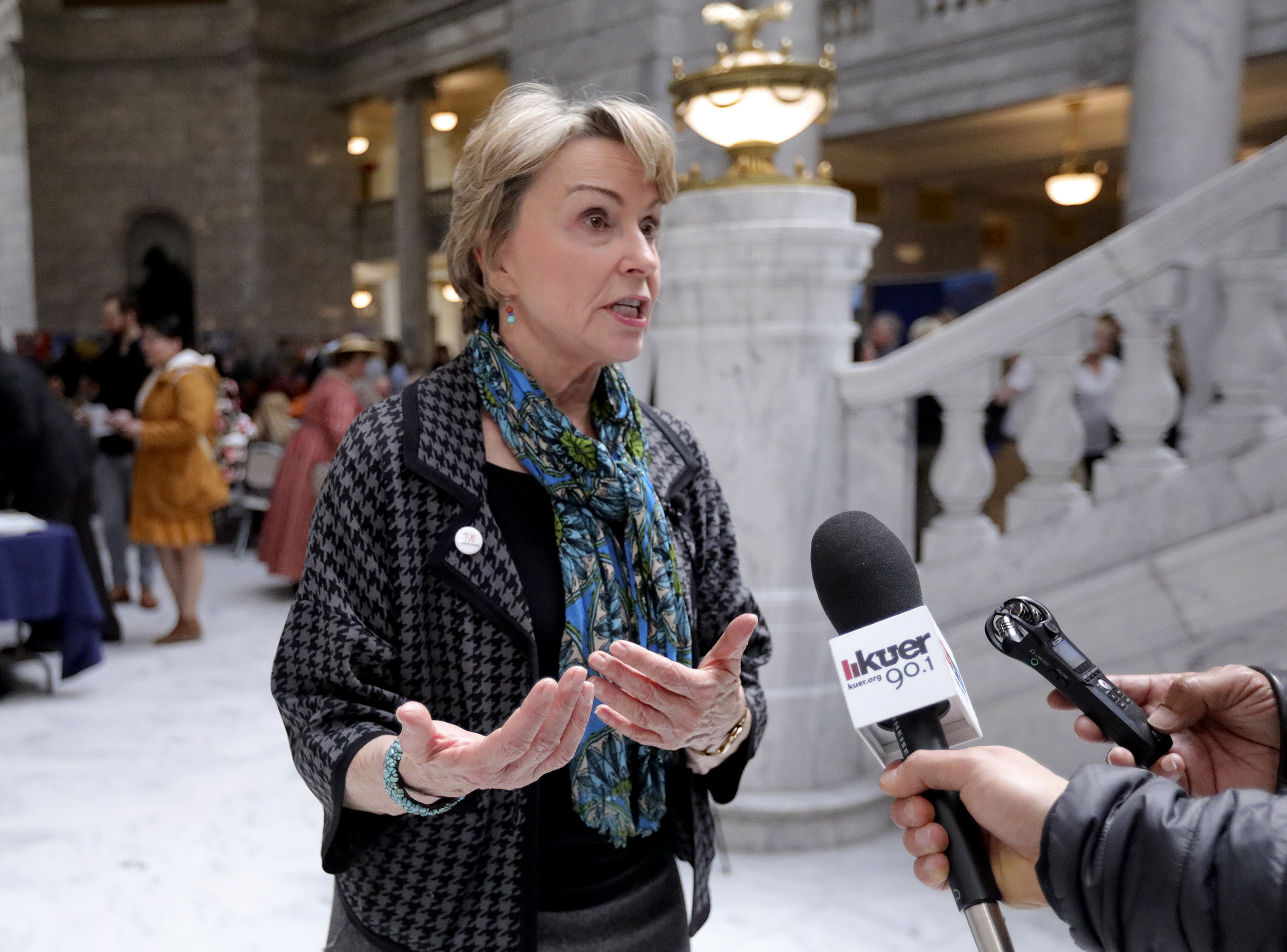 Vicki Varela, managing director of the Utah Office of Tourism, talks to members of the media during Tourism Day at the Capitol in Salt Lake City on Wednesday, March 4, 2020.