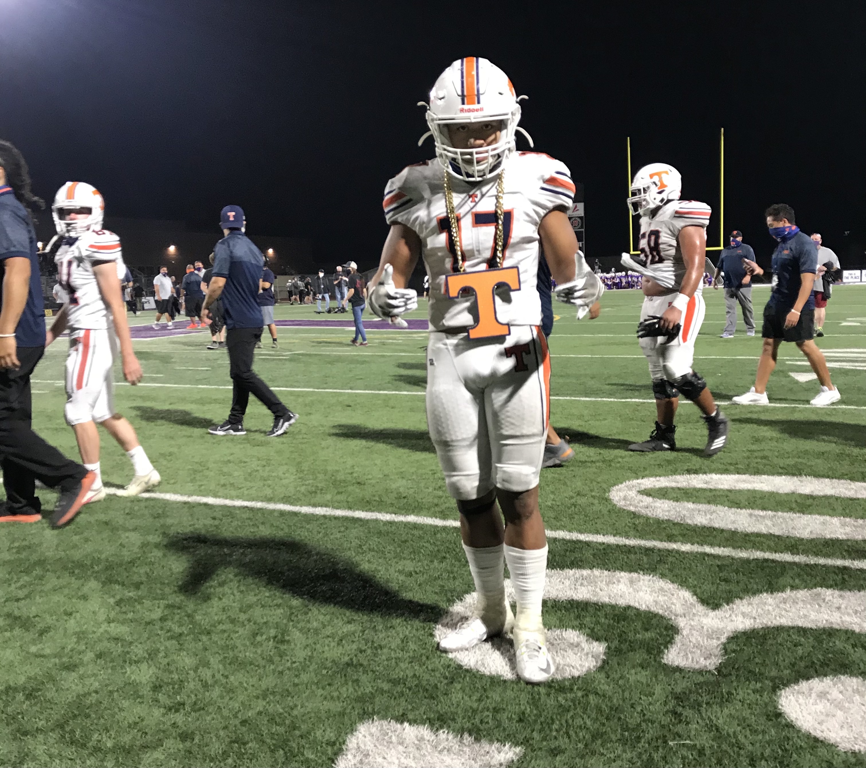 Timpview's Ammon Key poses with the Thunderbirds' turnover chain after sealing Timpview's 28-14 win over Lehi with his second interception, Friday, Sept. 25, 2020 in Lehi.