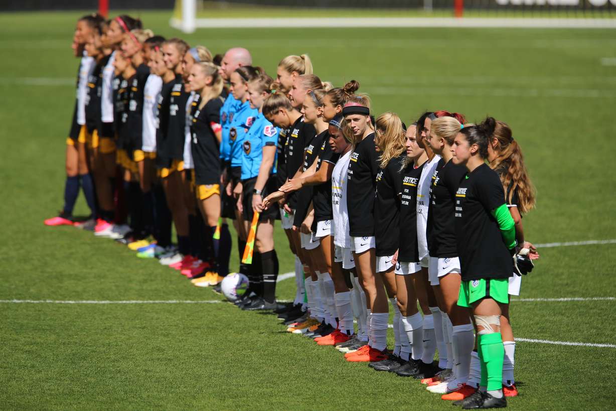 Players of Utah Royals FC and OL Reign FC lines up before the start of a NWSL soccer game at Rio Tinto Stadium in Sandy on Saturday, Sept. 26, 2020.