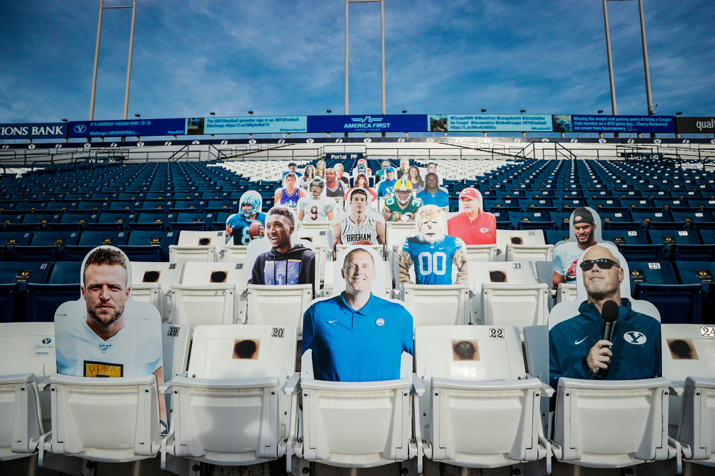 New Orleans Saints quarterback Taysom Hill, BYU basketball coach Mark Pope and BYU Hall of Famer Jim McMahon are among the cut-outs of fans that filled the stands in the LaVell Edwards Stadium in Provo for BYU's home opener against Troy, which was played to help stem the spread of COVID-19.