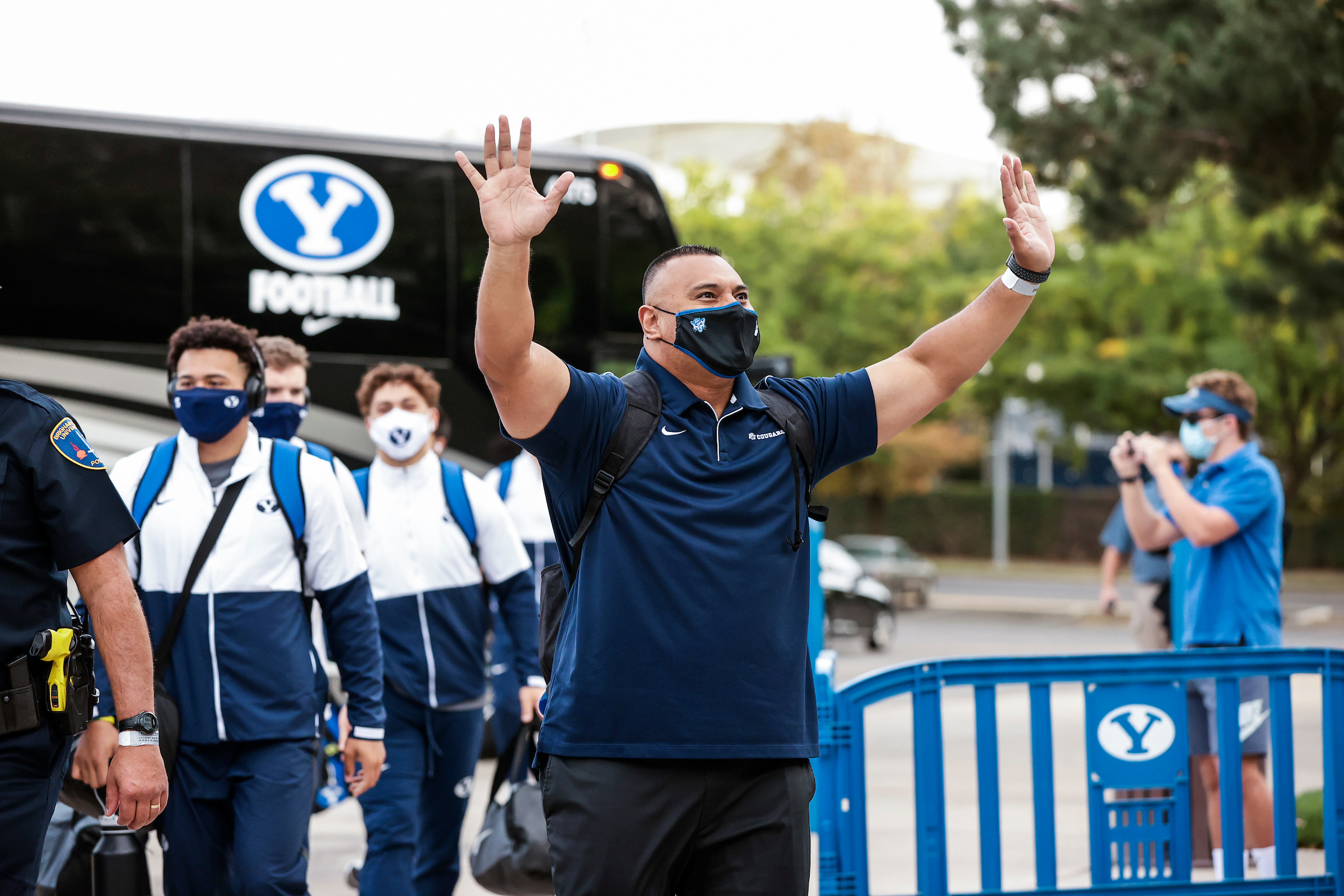 Coach Kalani Sitake enters the LaVell Edwards Stadium in Provo, Utah in preparation for the BYU game against Troy