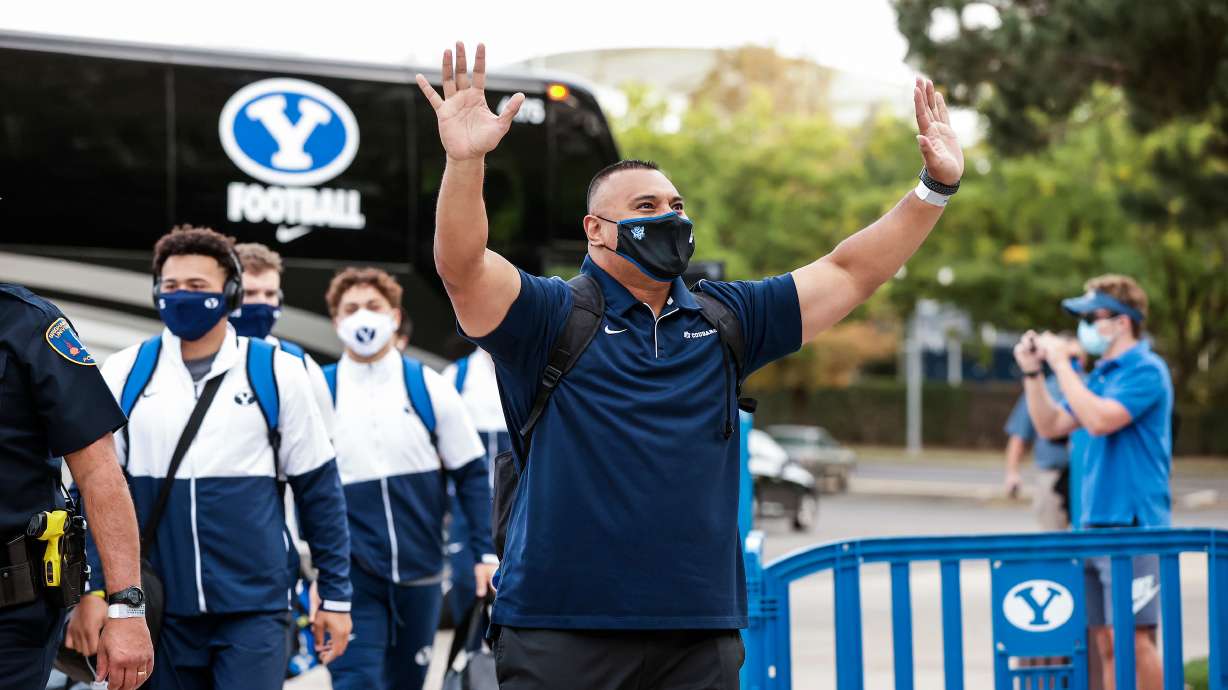 Coach Kalani Sitake enters the LaVell Edwards Stadium in Provo, Utah in preparation for the BYU game against Troy
