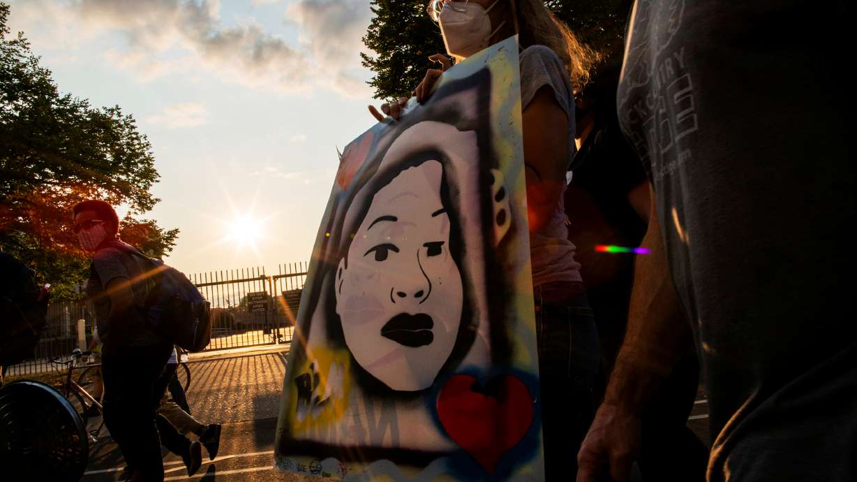 Protesters march during a peaceful protest after a grand jury decided not to bring homicide charges against police officers involved in the fatal shooting of Breonna Taylor, in Louisville, Kentucky September 26, 2020. REUTERS/Eduardo Munoz