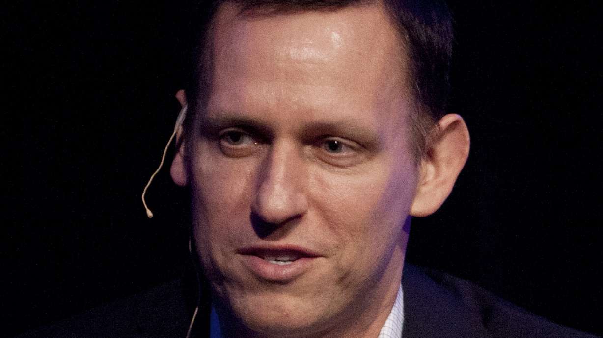 Secretive, never profitable Palantir makes market debut