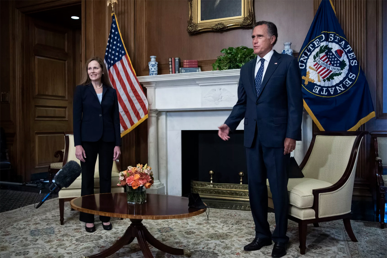 Judge Amy Coney Barrett, President Donald Trumps nominee for the U.S. Supreme Court, meets with Sen. Mitt Romney, R-Utah, on Capitol Hill in Washington on Wednesday, Sept. 30, 2020.