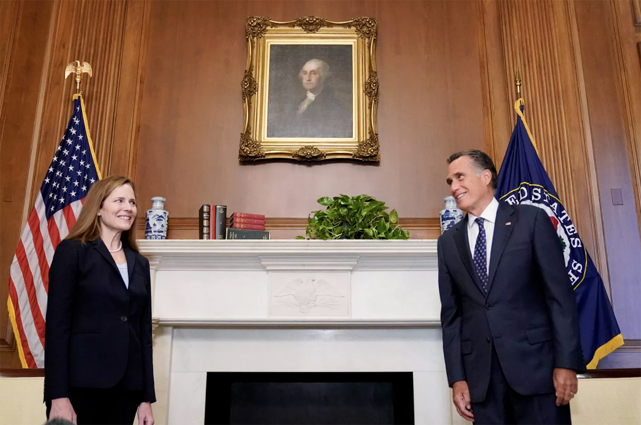 Judge Amy Coney Barrett, President Donald Trumps nominee for the U.S. Supreme Court, meets with Sen. Mitt Romney, R-Utah, on Capitol Hill in Washington on Wednesday, Sept. 30, 2020.