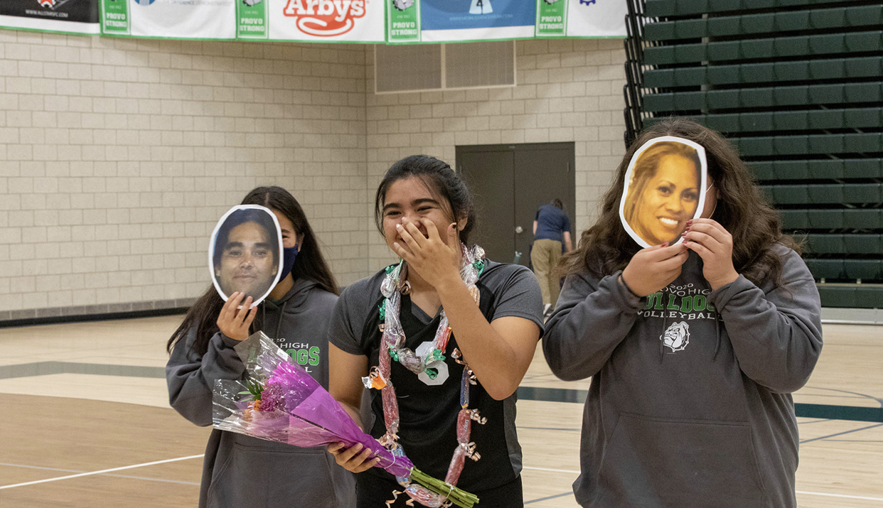 Sophomore Mia Brown, left, and sophomore Alana Toutai accompany Provo senior Kamia Masuda, center, during the Bulldogs' senior night, Thursday, Sept. 24, 2020 in Provo.