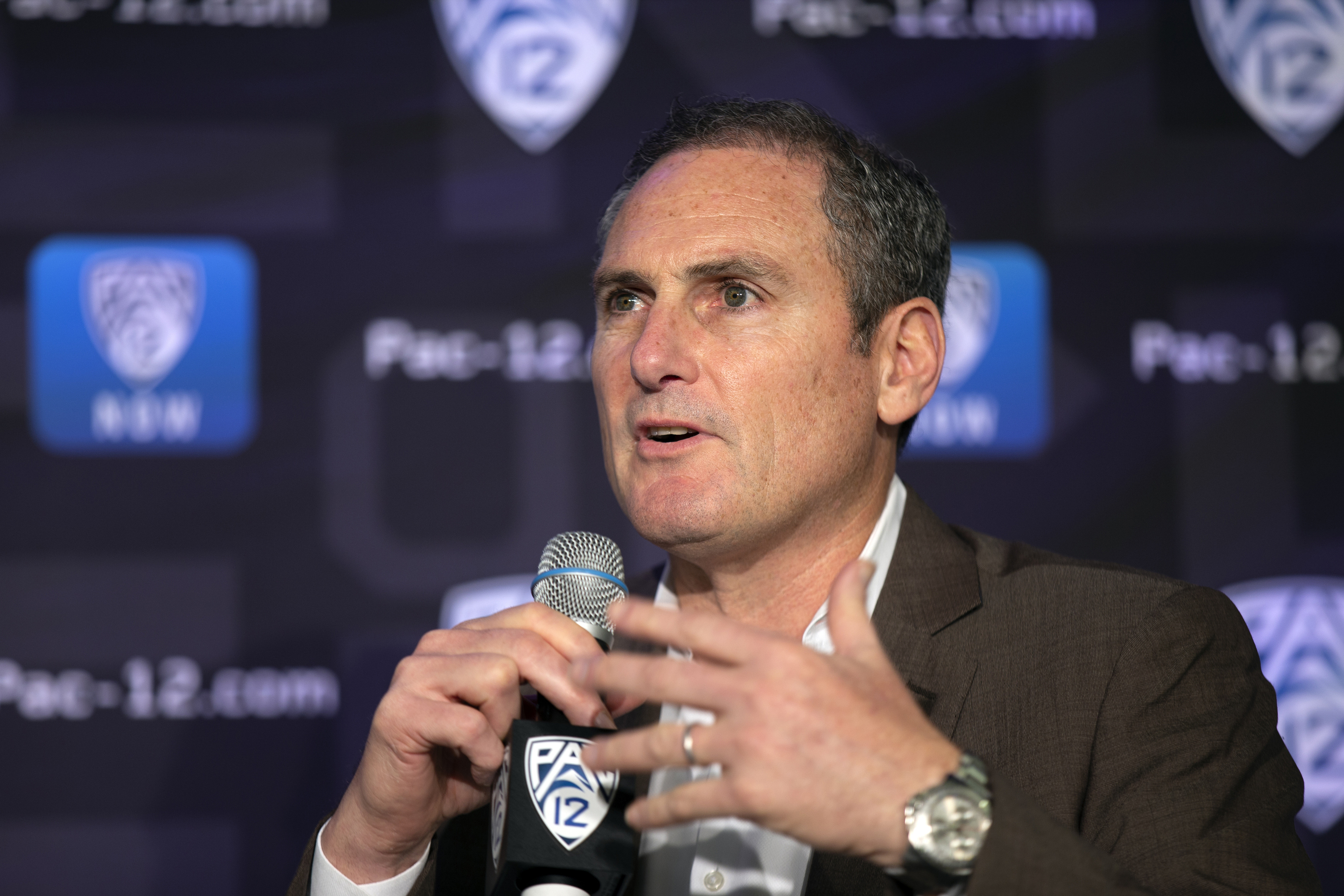 FILE - In this Oct. 7, 2019, file photo, Pac-12 Commissioner Larry Scott speaks to reporters during the Pac-12 Conference women's NCAA college basketball media day in San Francisco. The Pac-12 university presidents and chancellors will meet Friday, Sept. 17, 2020, and be presented options for staging a fall football season, but Commissioner Larry Scott says a vote by the the CEO Group is not expected. (AP Photo/D. Ross Cameron, File) [Sep-30-2020]