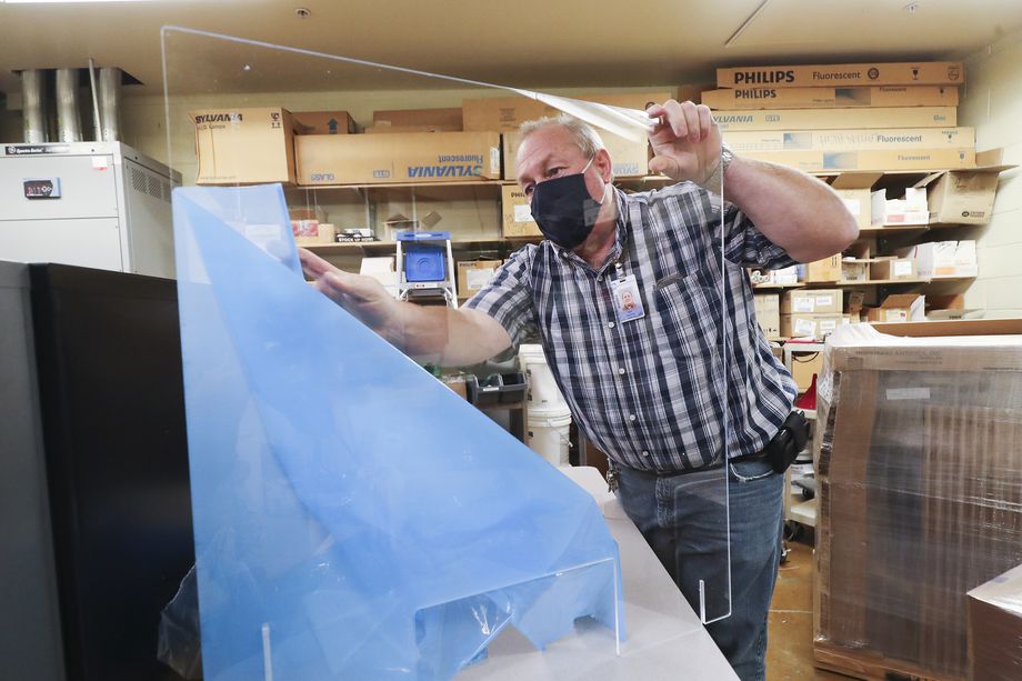 Layton High School facilities coordinator Rod Southam unpacks portable desk shields at the school in Layton on Tuesday, Sept. 29, 2020. Southam is the winner of Utah’s Recognizing Inspirational School Employees (RISE) award, which honors classified school employees who exemplify excellence in work performance, leadership and community involvement. He will be Utah’s nominee for the U.S. Department of Education RISE award.