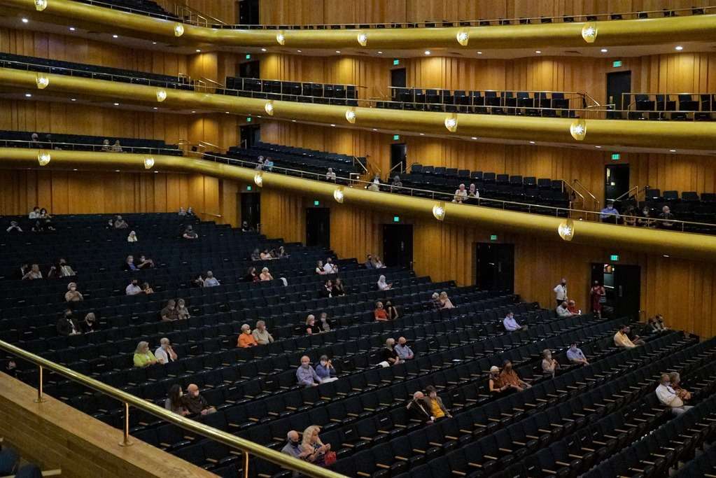 Concertgoers utilizing faces masks and social distancing attend a recent performance of the Utah Symphony at Abravanel Hall in Salt Lake City, as seen in this 2020 handout photo.