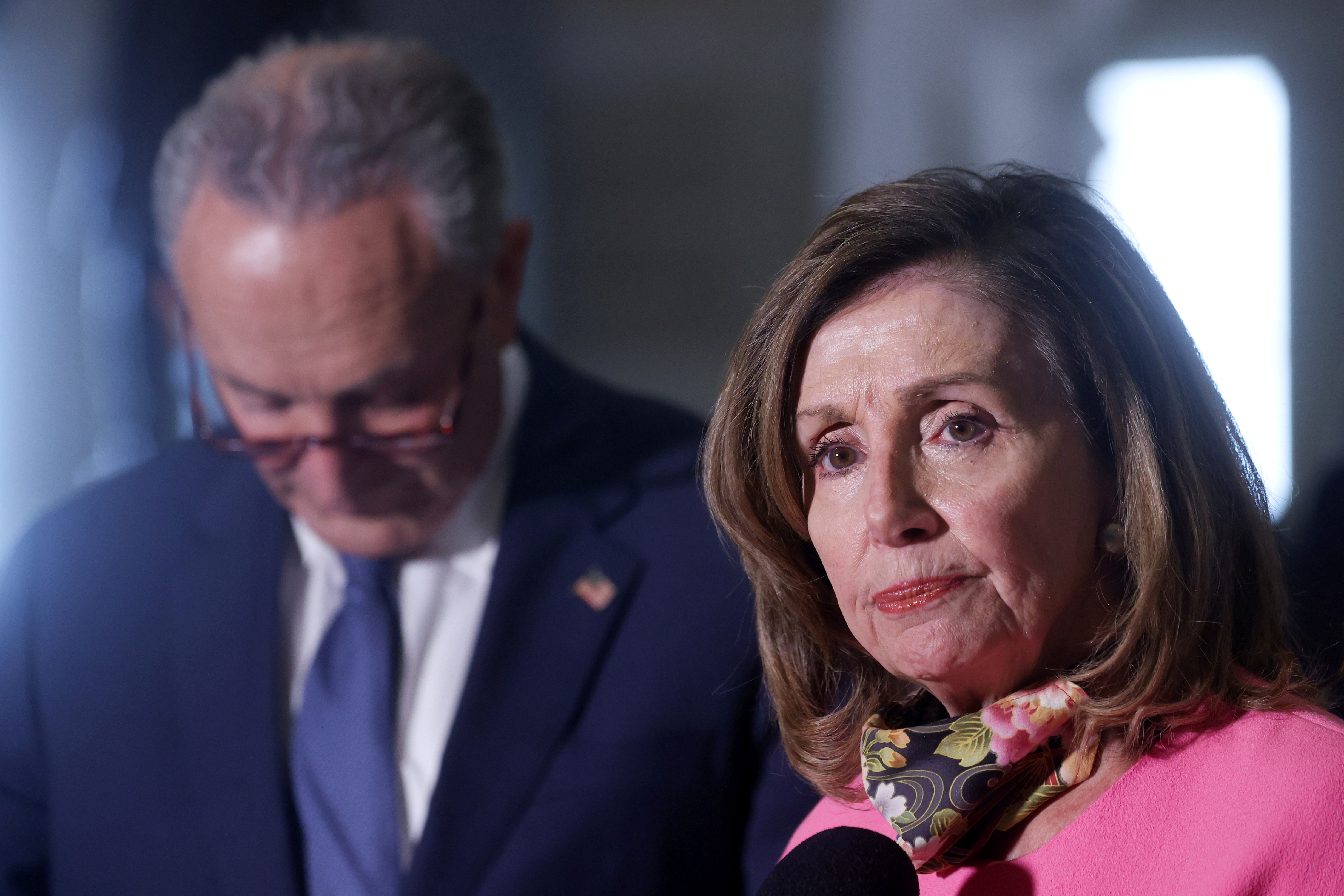 FILE PHOTO: U.S. House Speaker Nancy Pelosi (D-CA) and Senate Minority Leader Chuck Schumer (D-NY) speak to reporters after their coronavirus relief negotiations with Treasury Secretary Steven Mnuchin and White House Chief of Staff Mark Meadows at the U.S. Capitol in Washington, U.S. August 7, 2020. REUTERS/Jonathan Ernst