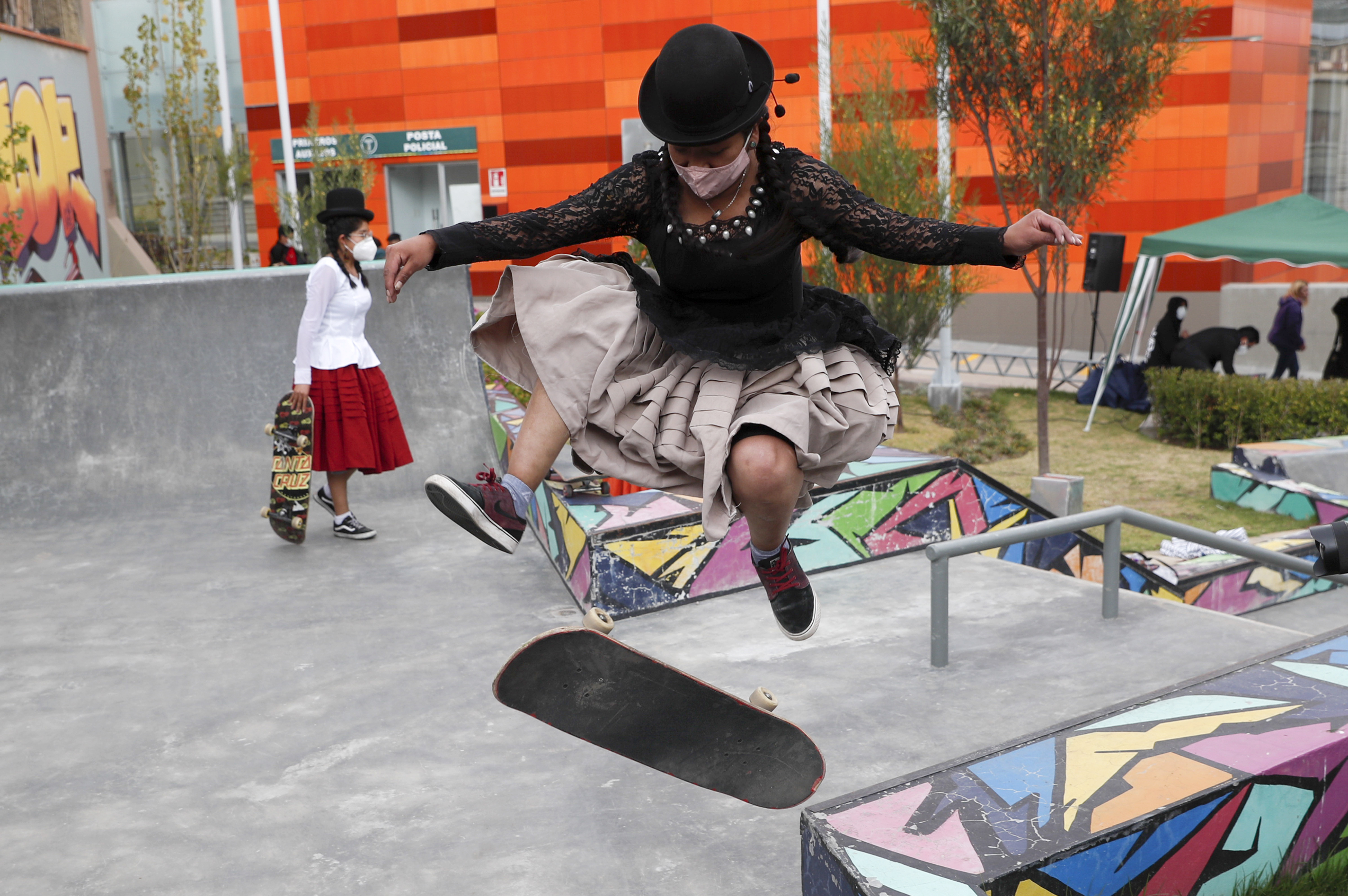 Bolivian women skateboard in Aymara garb to showcase culture
