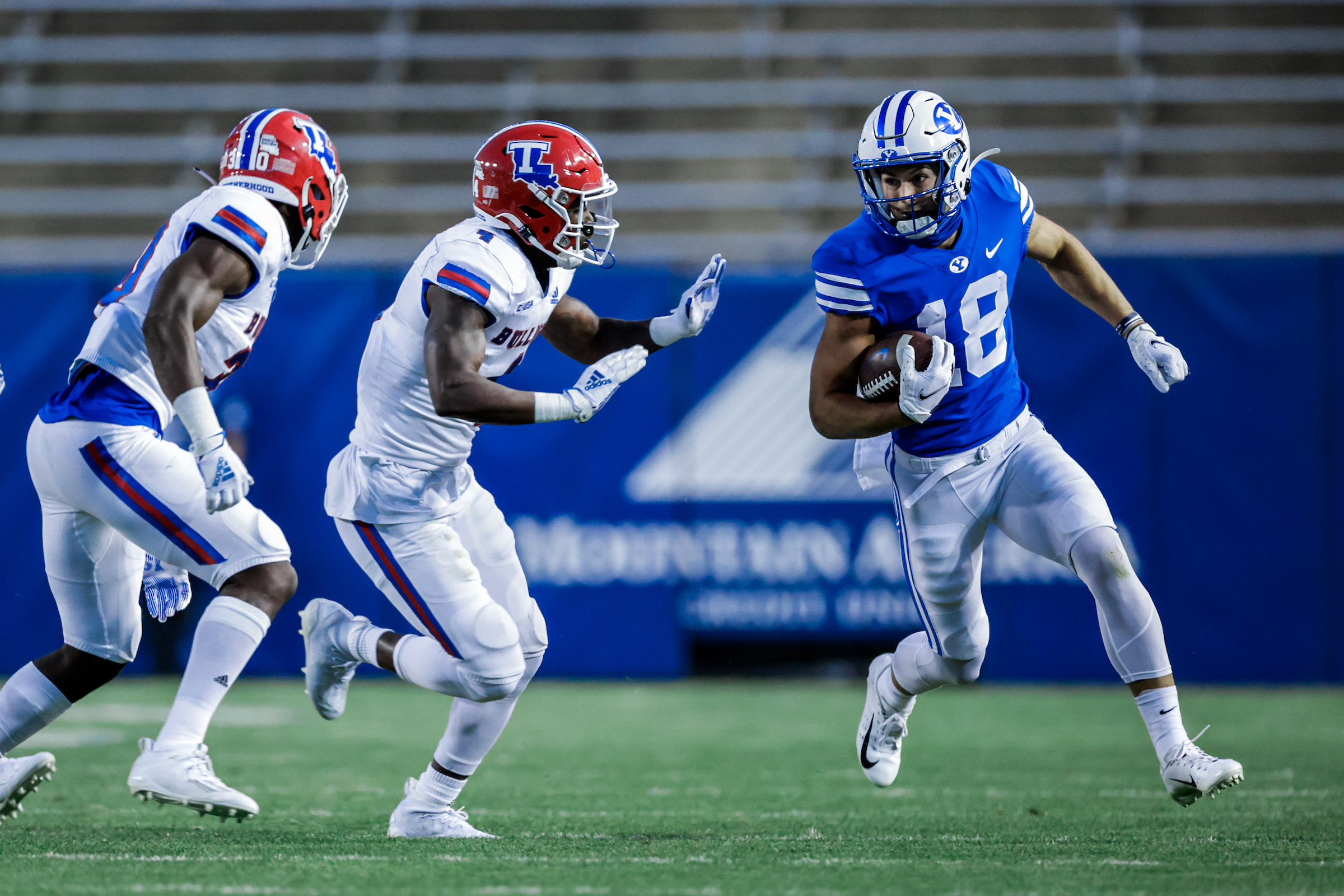 BYU wide receiver Gunner Romney after receiving a pass from quarterback Zach Wilson at LaVell Edwards Stadium against Louisiana Tech.