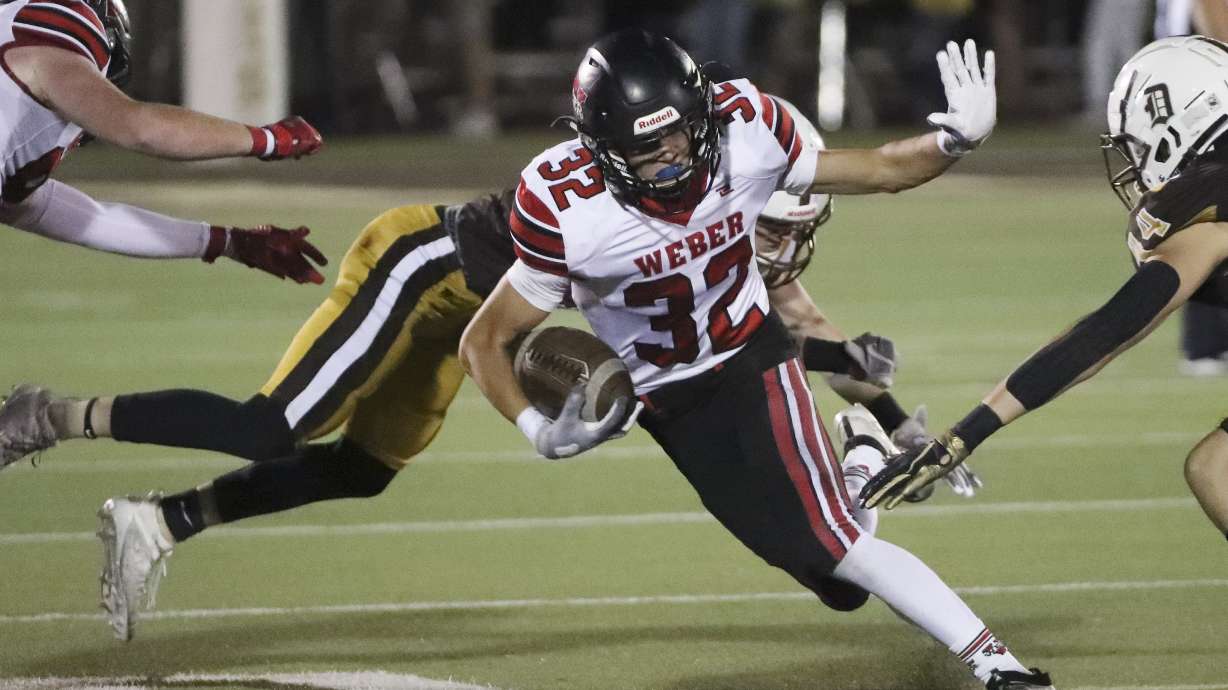Weber and Davis compete in a high school football game at Davis High School in Kaysville on Friday, Oct. 2, 2020.