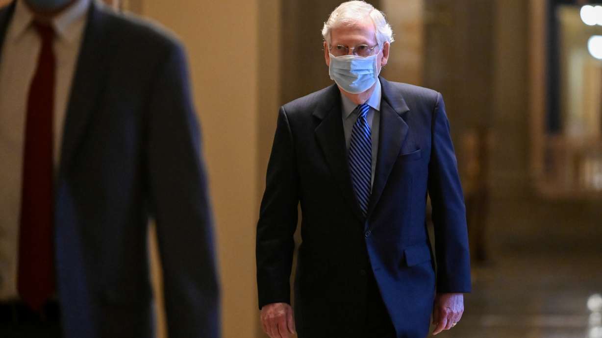 FILE PHOTO: U.S. Senate Majority Leader Mitch McConnell (R-KY) walks through the U.S. Capitol building in Washington, U.S., October 1, 2020. REUTERS/Erin Scott/File Photo