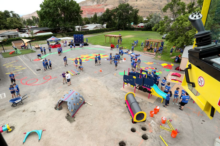 Volunteers transform an empty site into a kid-designed, state-of-the-art playground at James R. Russell Head Start in Salt Lake City in 2018. A new study notes that while Utah does have several programs to help with a child’s mental well-being such as Head Start, overall the state lacks enough resources focused on children’s mental health. 
