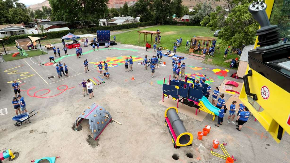 Volunteers transform an empty site into a kid-designed, state-of-the-art playground at James R. Russell Head Start in Salt Lake City in 2018. A new study notes that while Utah does have several programs to help with a child’s mental well-being such as Head Start, overall the state lacks enough resources focused on children’s mental health.