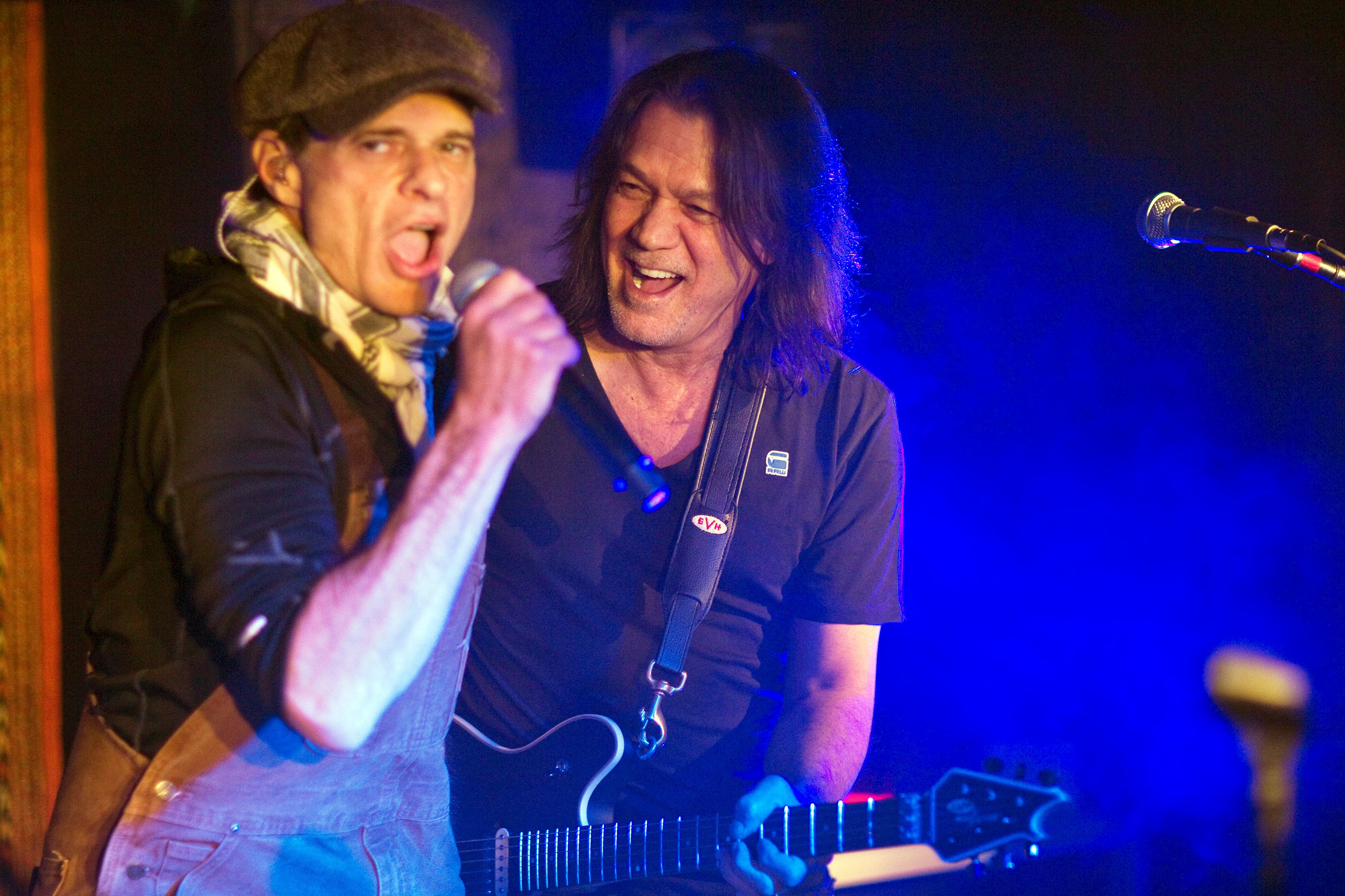 Singer David Lee Roth performs with Eddie Van Halen (R) during a private Van Halen show to announce their upcoming tour at Cafe Wha? in New York January 5, 2012.