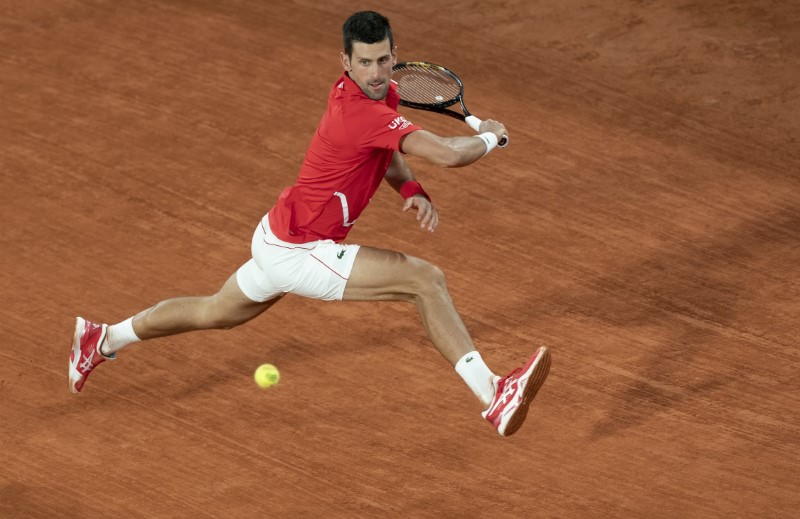 Oct 5, 2020; Paris, France; Novak Djokovic (SRB) in action during his match against Karen Khachanov (RUS) on day eight at Stade Roland Garros. Mandatory Credit: Susan Mullane-USA TODAY Sports