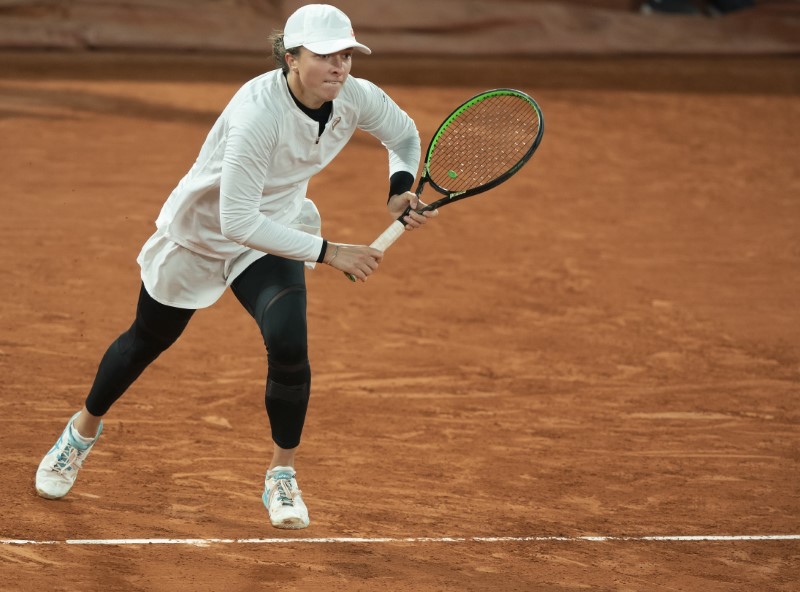 Oct 6, 2020; Paris, France; Iga Swiatek (POL) in action during her match against Martina Trevisan (ITA) on day 10 at Stade Roland Garros. Mandatory Credit: Susan Mullane-USA TODAY Sports