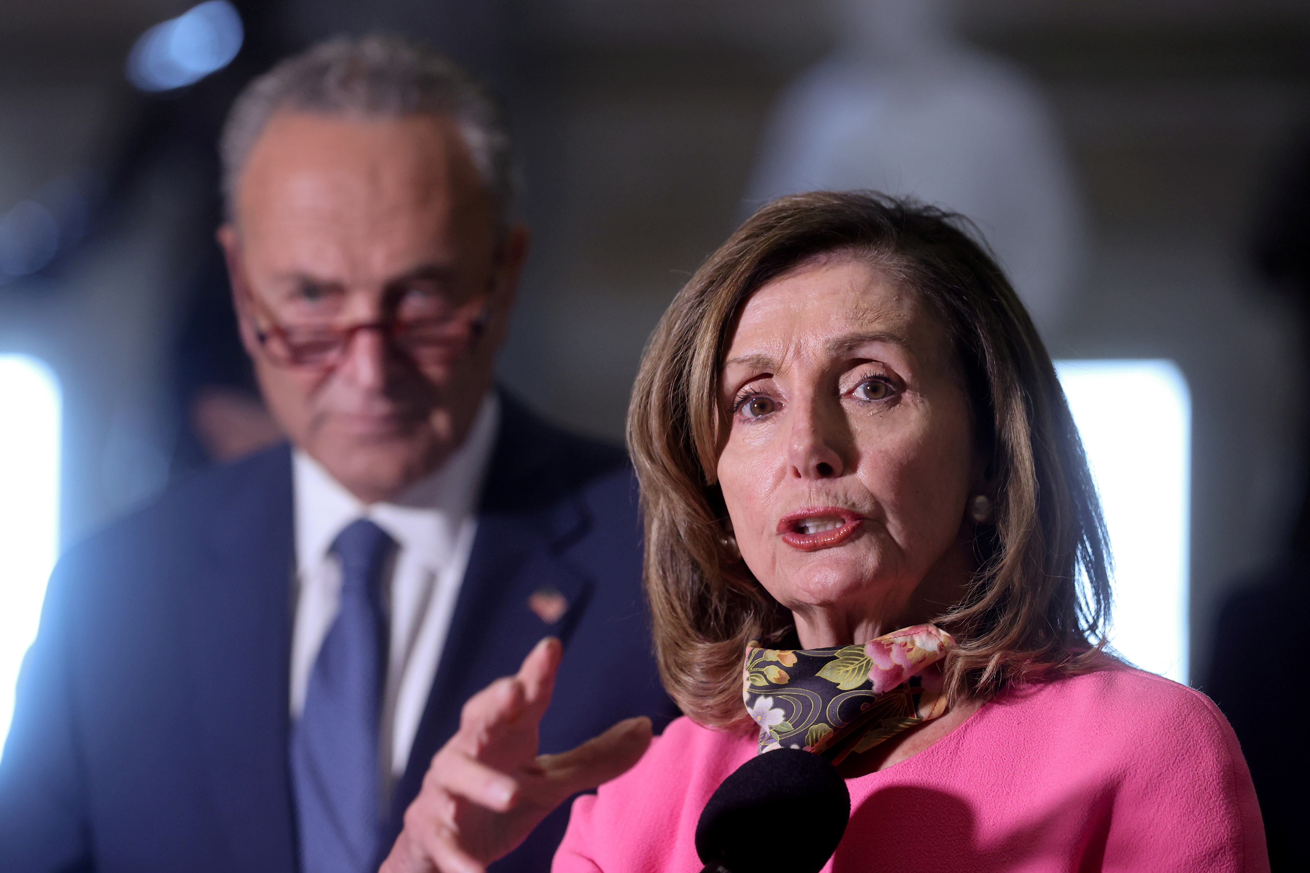 FILE PHOTO: U.S. House Speaker Nancy Pelosi (D-CA) and Senate Minority Leader Chuck Schumer (D-NY) speak to reporters after their coronavirus relief negotiations with Treasury Secretary Steven Mnuchin and White House Chief of Staff Mark Meadows at the U.S. Capitol in Washington, U.S. August 7, 2020.