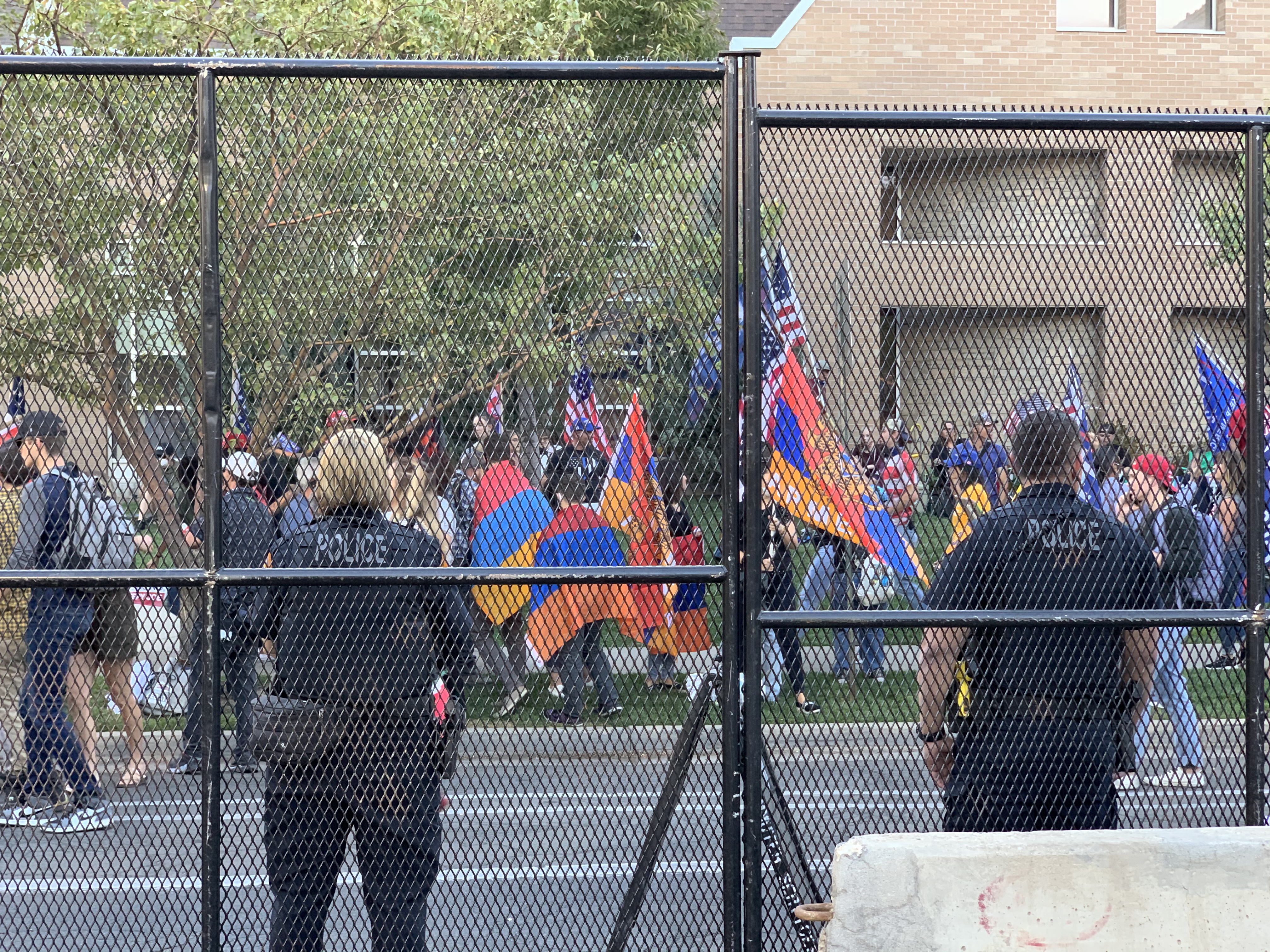 Police officers patrol the outside of the perimeter of Presidential Circle at the University of Utah on Wednesday, Oct. 7, 2020.