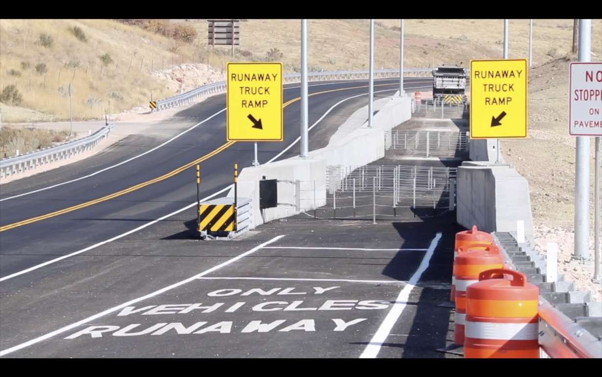 Signs point to a new runaway truck ramp that opened Thursday near Garden City. It aims to curtail the frequent crashes that have been occurring in the city's Raspberry Square.