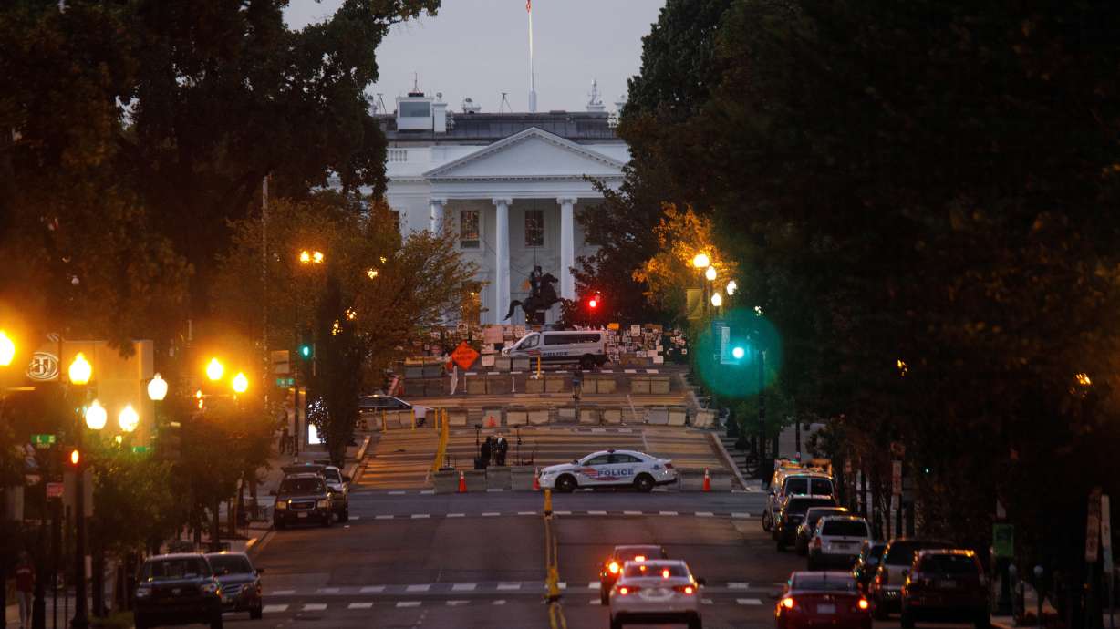 The White House is seen at sunrise at the end of 16th Street Northwest in Washington, U.S., October 9, 2020. REUTERS/Tom Brenner