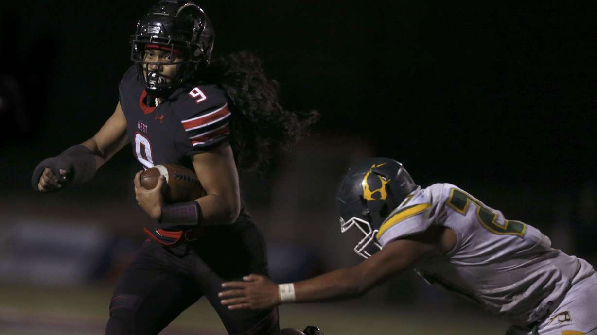West High and Kearns compete in a high school football game at West High School in Salt Lake City on Friday, Oct. 9, 2020.