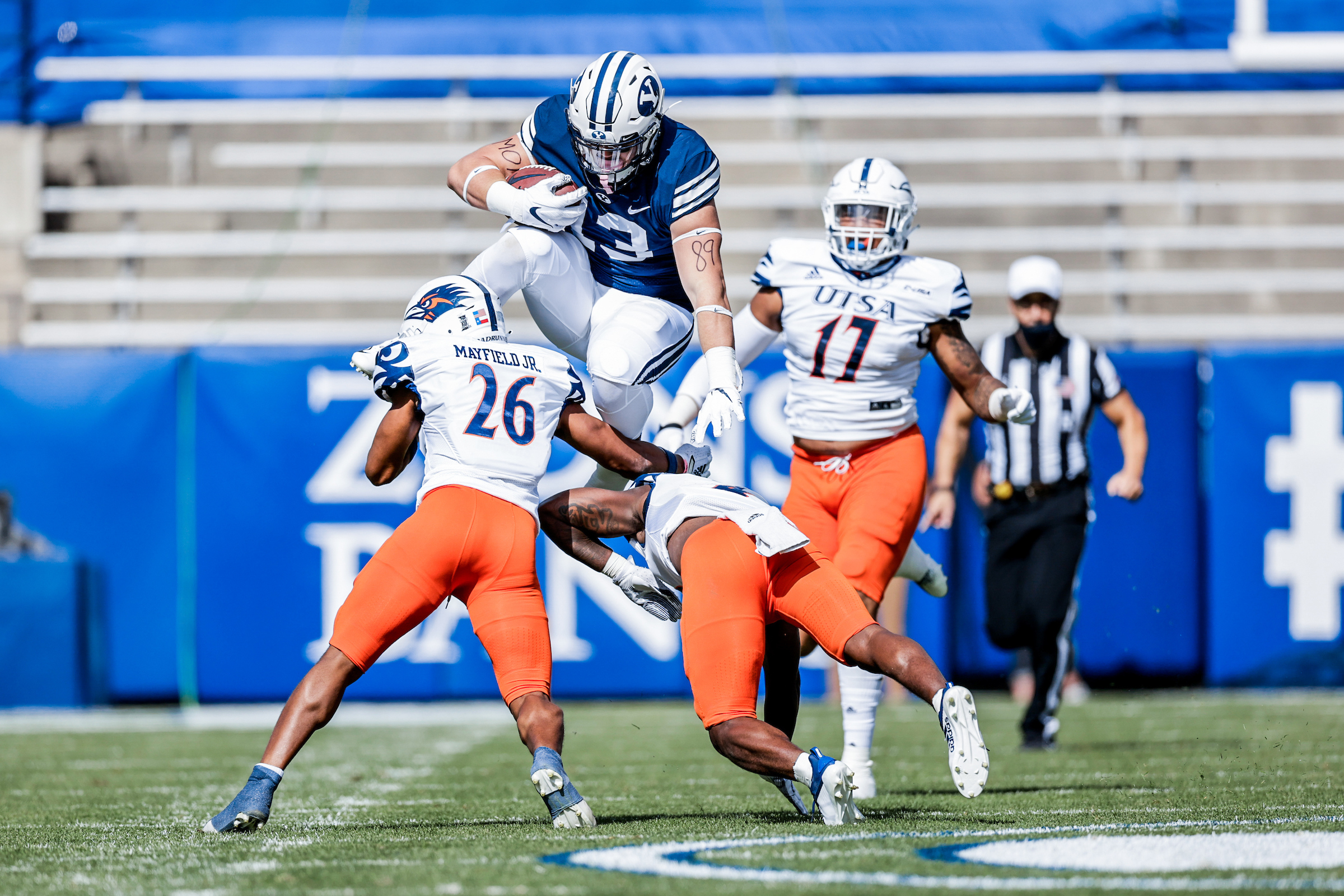 Masen Wake tries to hurdle a defender against UTSA, Saturday, Oct. 10, 2020 in Provo.