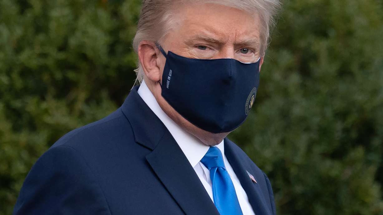 US President Donald Trump walks to Marine One prior to departure from the South Lawn of the White House in Washington, DC, October 2, 2020, as he heads to Walter Reed Military Medical Center, after testing positive for Covid-19. - President Donald Trump will spend the coming days in a military hospital just outside Washington to undergo treatment for the coronavirus, but will continue to work, the White House said Friday