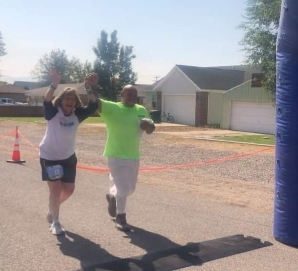 Carrie Kelley and Fidel Ybarra cross the finish line together.

Picture taken by Elizabeth Ashby