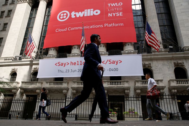 FILE PHOTO: A banner for communications software provider Twilio Inc., hangs on the facade of the New York Stock Exchange (NYSE) to celebrate the company's IPO in New York City, U.S., June 23, 2016. REUTERS/Brendan McDermid