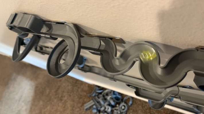 Marbles roll down one of Bryan Stringham's marble tracks.