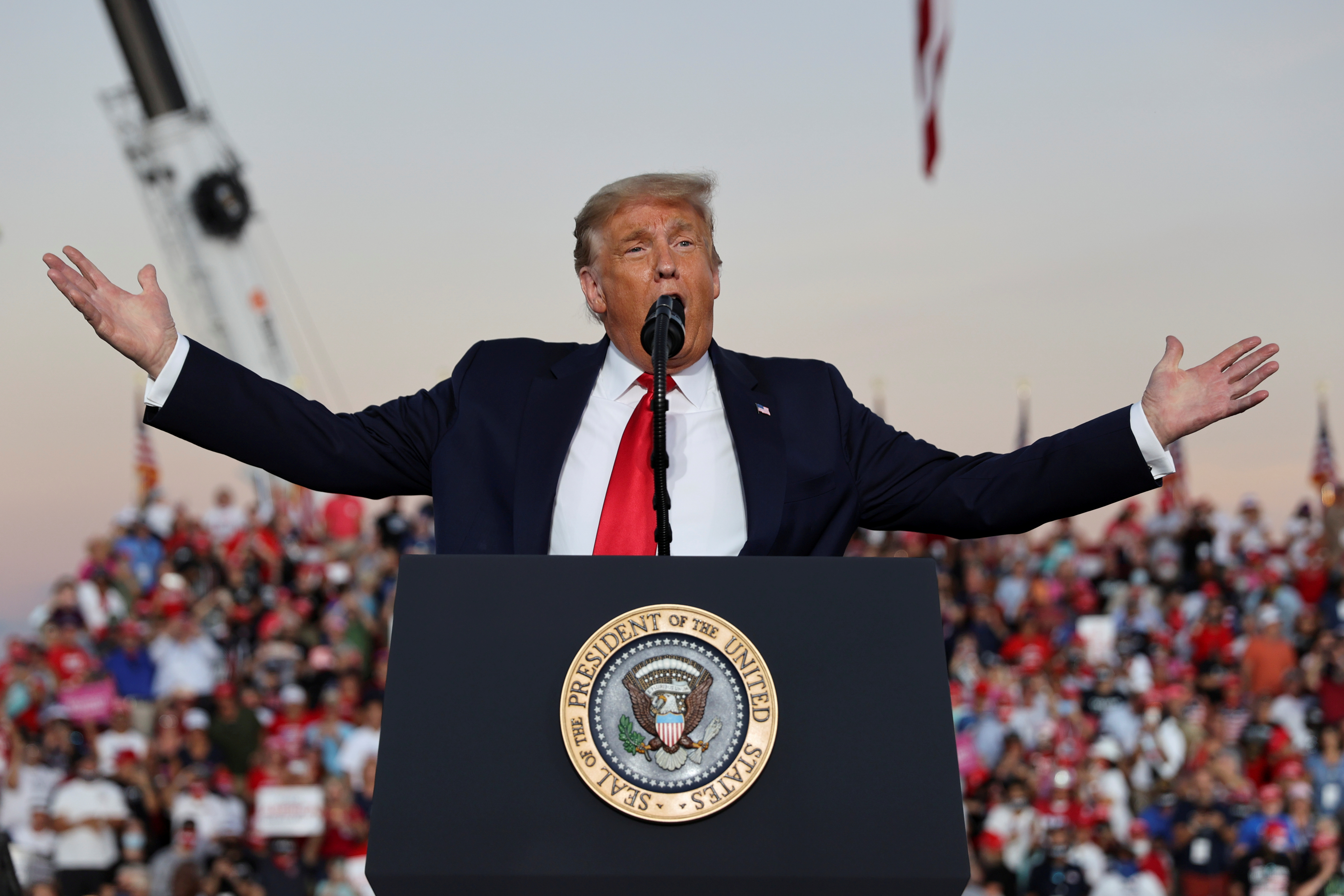 U.S. President Donald Trump speaks during a campaign rally, his first since being treated for the coronavirus disease (COVID-19), at Orlando Sanford International Airport in Sanford, Florida, U.S., October 12, 2020.
