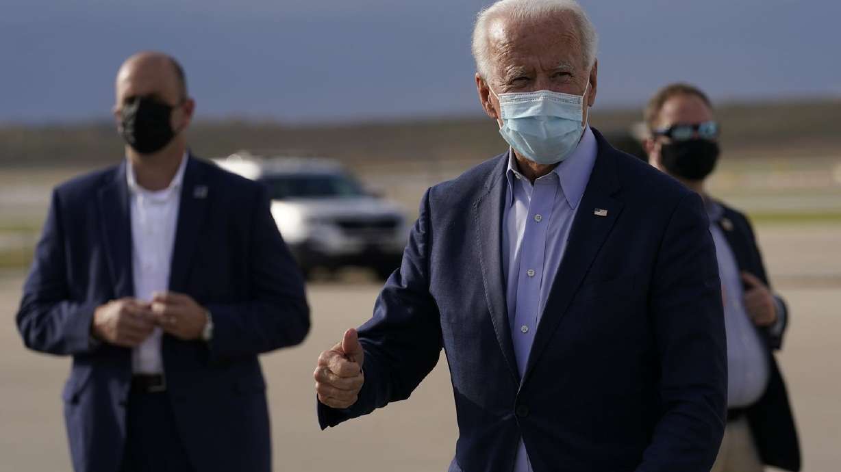 Democratic presidential candidate former Vice President Joe Biden arrives at Cincinnati/Northern Kentucky International Airport, in Hebron, Ky., Monday, Oct. 12, 2020.