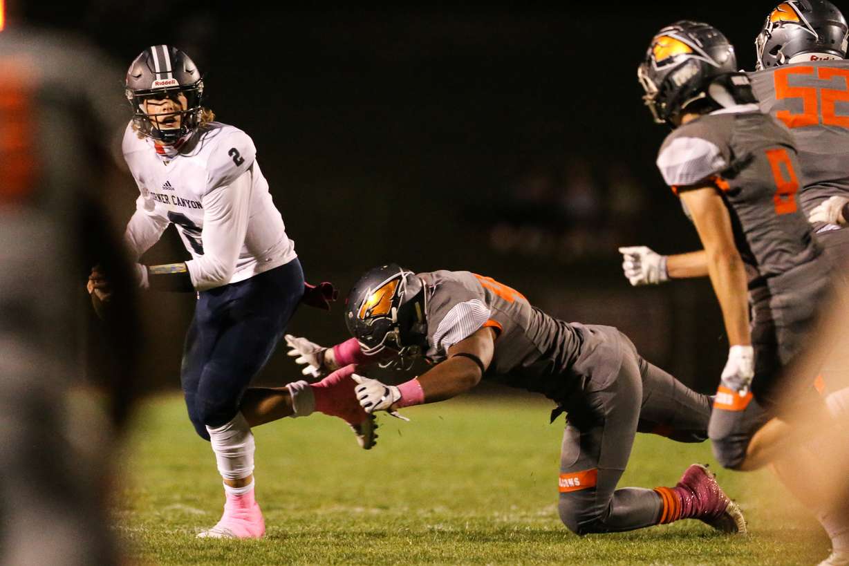 Skyridge takes on Corner Canyon quarterback Jaxson Dart during a high school football game at Skyridge High School in Lehi on Thursday, Oct. 8, 2020. Dart was named 2020-21 national high school football player of the year by Gatorade, it was announced Wednesday.
