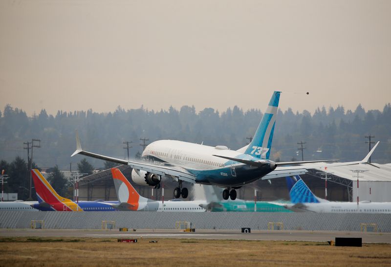 FILE PHOTO: A Boeing 737 MAX 7 aircraft lands during an evaluation flight at Boeing Field in Seattle, Washington, U.S. September 30, 2020. REUTERS/Lindsey Wasson