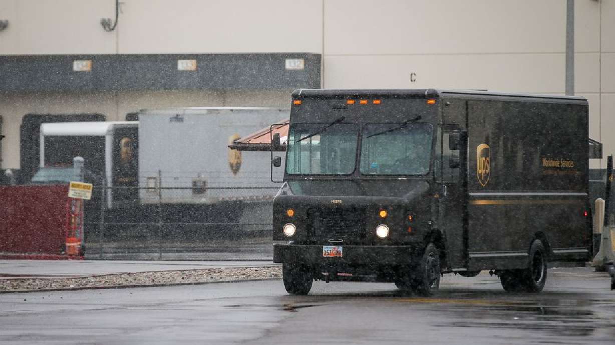 A truck leaves a UPS facility in West Valley City, Utah, on Wednesday, Nov. 27, 2019.