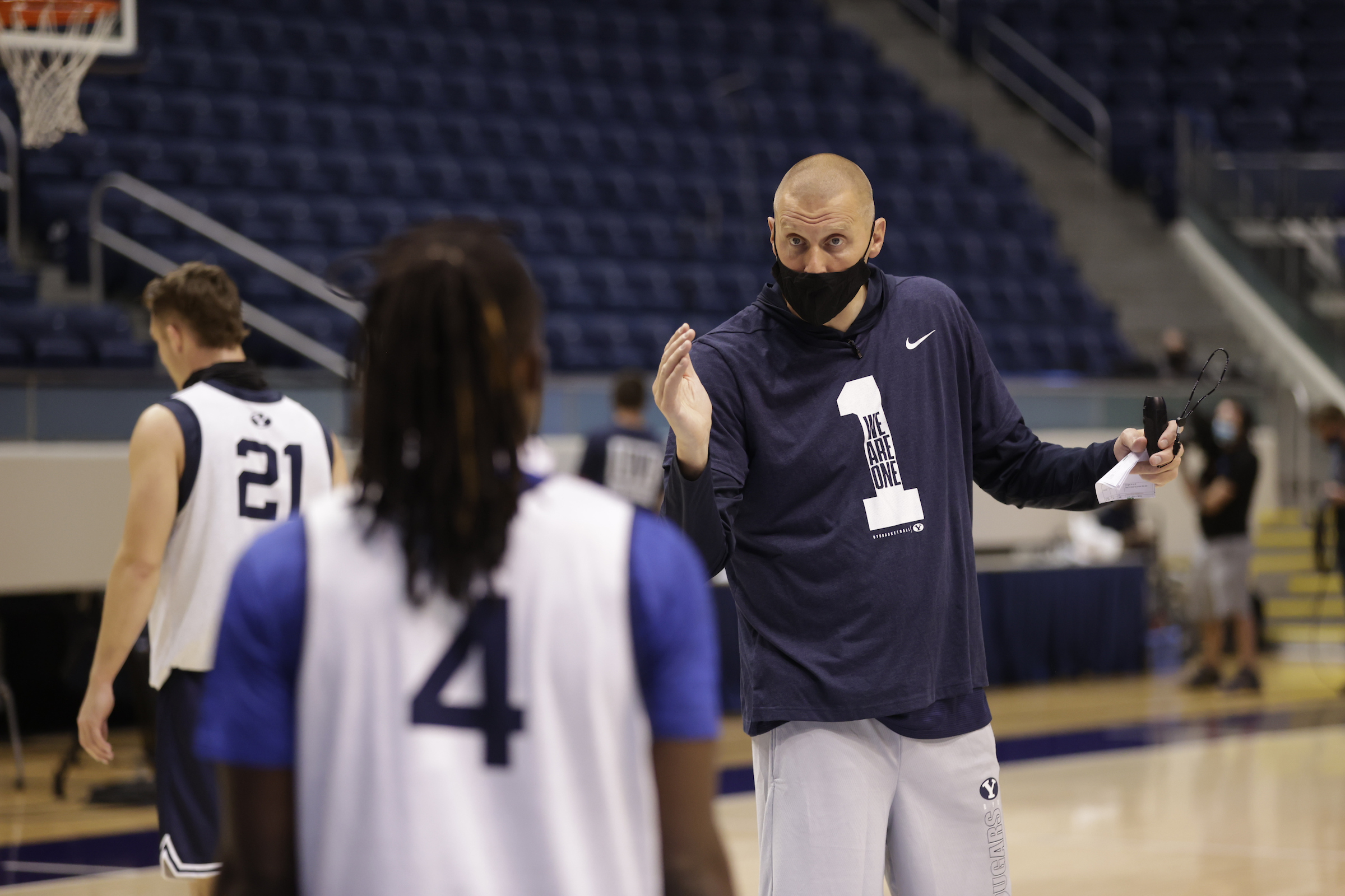 BYU coach Mark Pope talks to point guard Brandon Averette during the first day of practice, Wednesday, Oct. 14, 2020 in the Marriott Center in Provo.