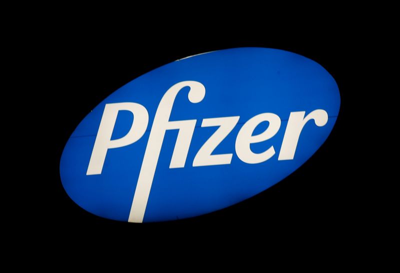 FILE PHOTO: The logo of U.S. pharmaceutical corporation Pfizer Inc. is seen at a branch in Zurich, Switzerland October 2, 2018.  REUTERS/Arnd Wiegmann