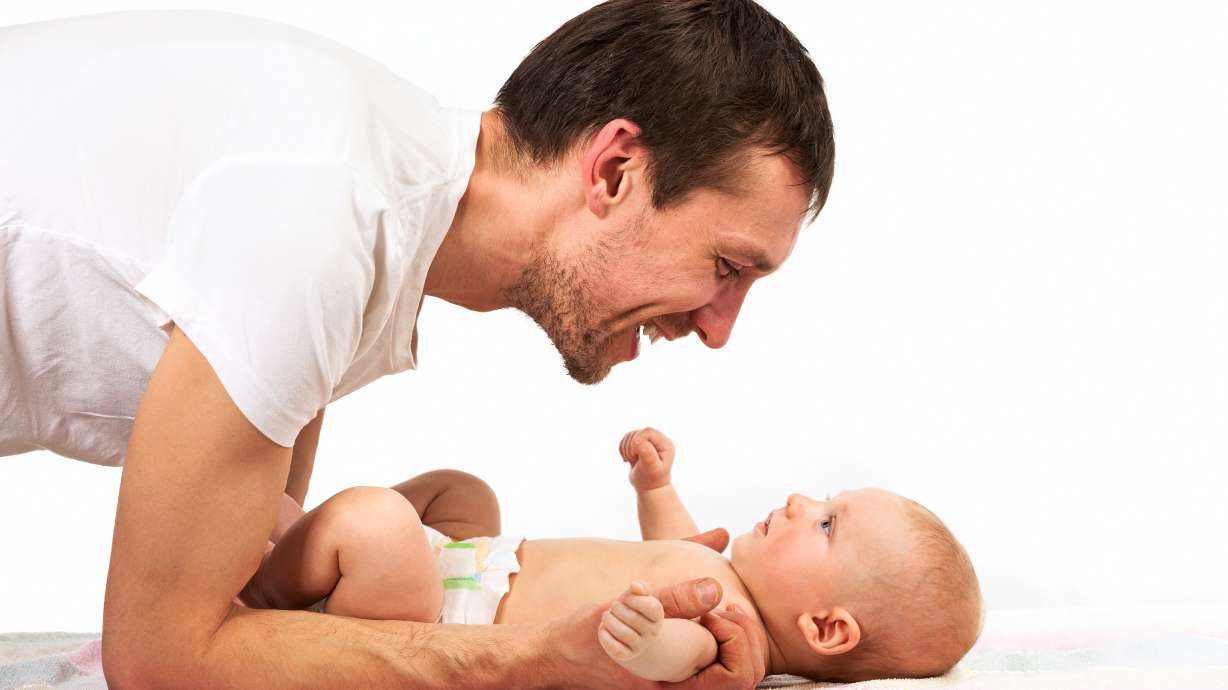 A key to happiness for dads? Being present with newborns.