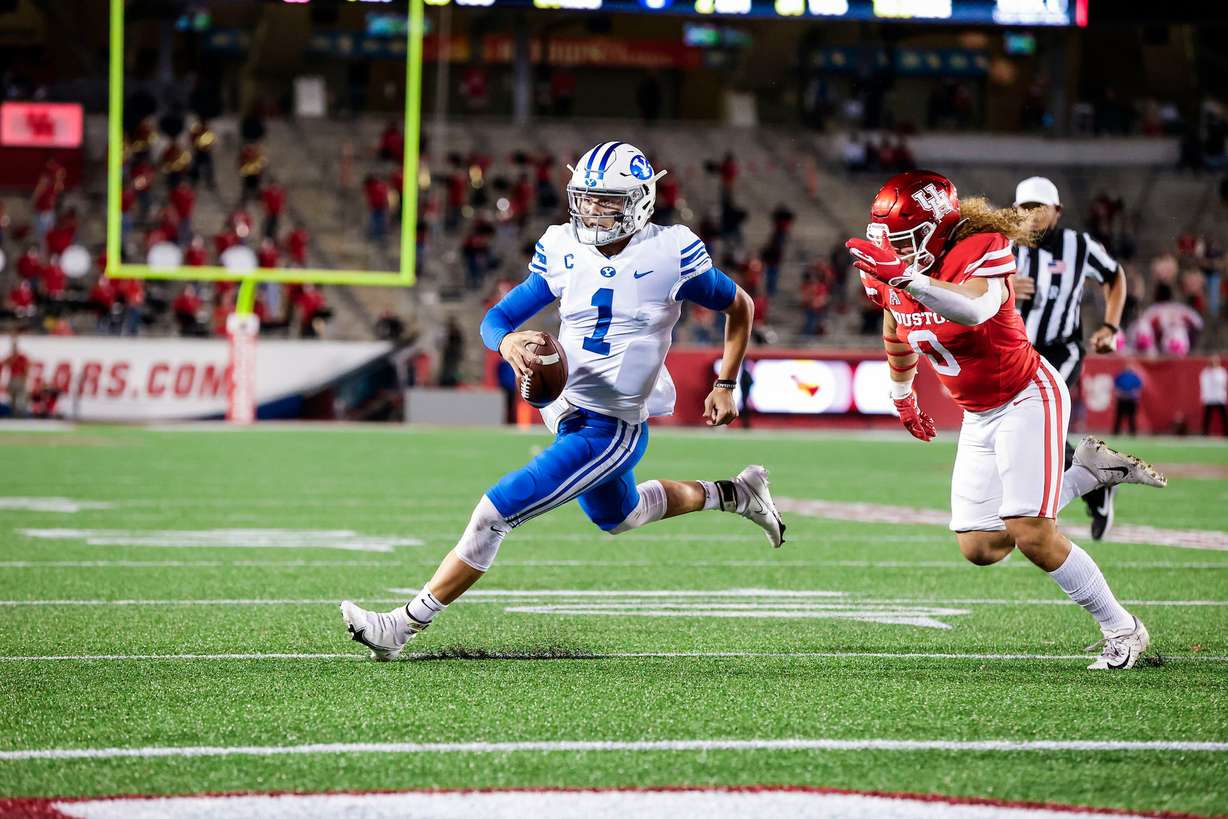BYU quarterback Zach Wilson runs for the touchdown in the first quarter as the Cougars play Houston at TDECU Stadium in Houston, Texas, Friday, Oct. 16, 2020.