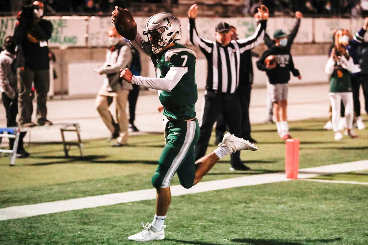 Olympusâ Tommy Hoggan (7) celebrates after he scores the teamâs game-winning touchdown against Skyline during a high school football game at Olympus High School in Holladay on Friday, Oct. 16, 2020.